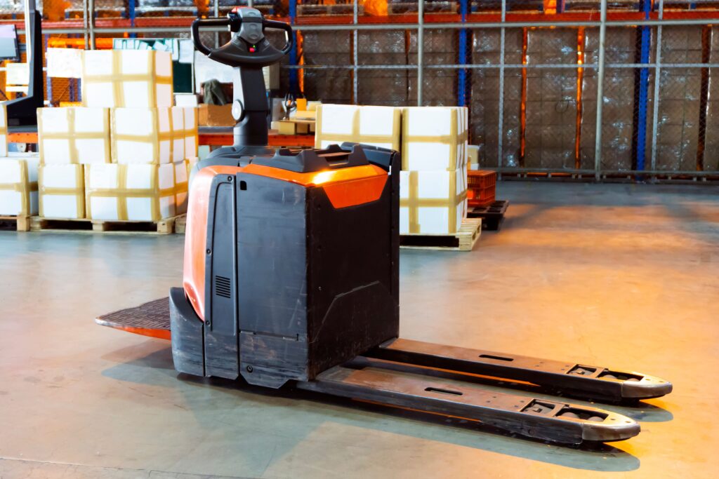 Electric pallet jack in a factory
